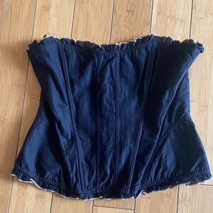 Sleek Black Strapless Corset Top with Ruffled Edges